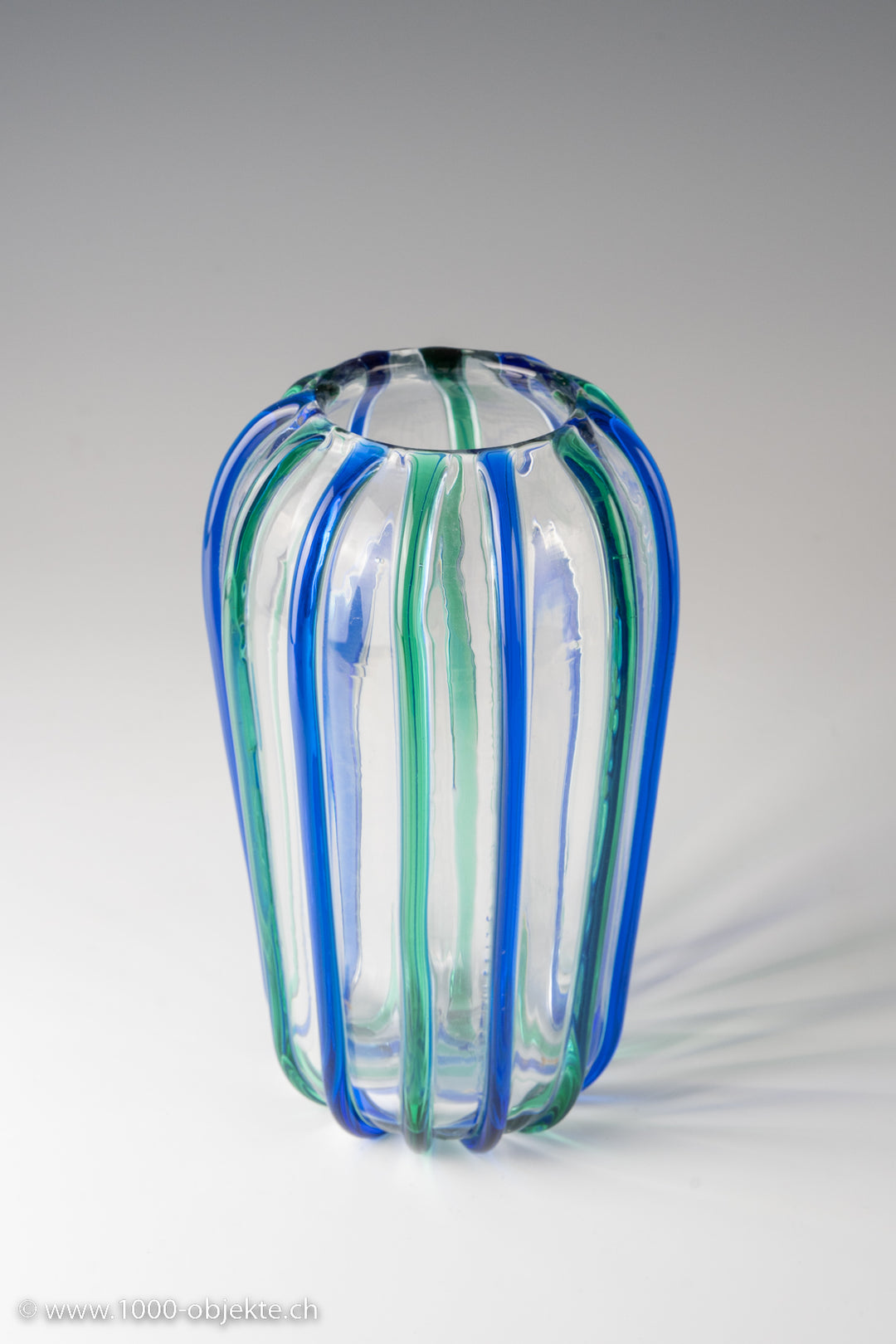 Archimede Seguso, clear glass with alternating blue and green applied stripes. Each signed on bottom.